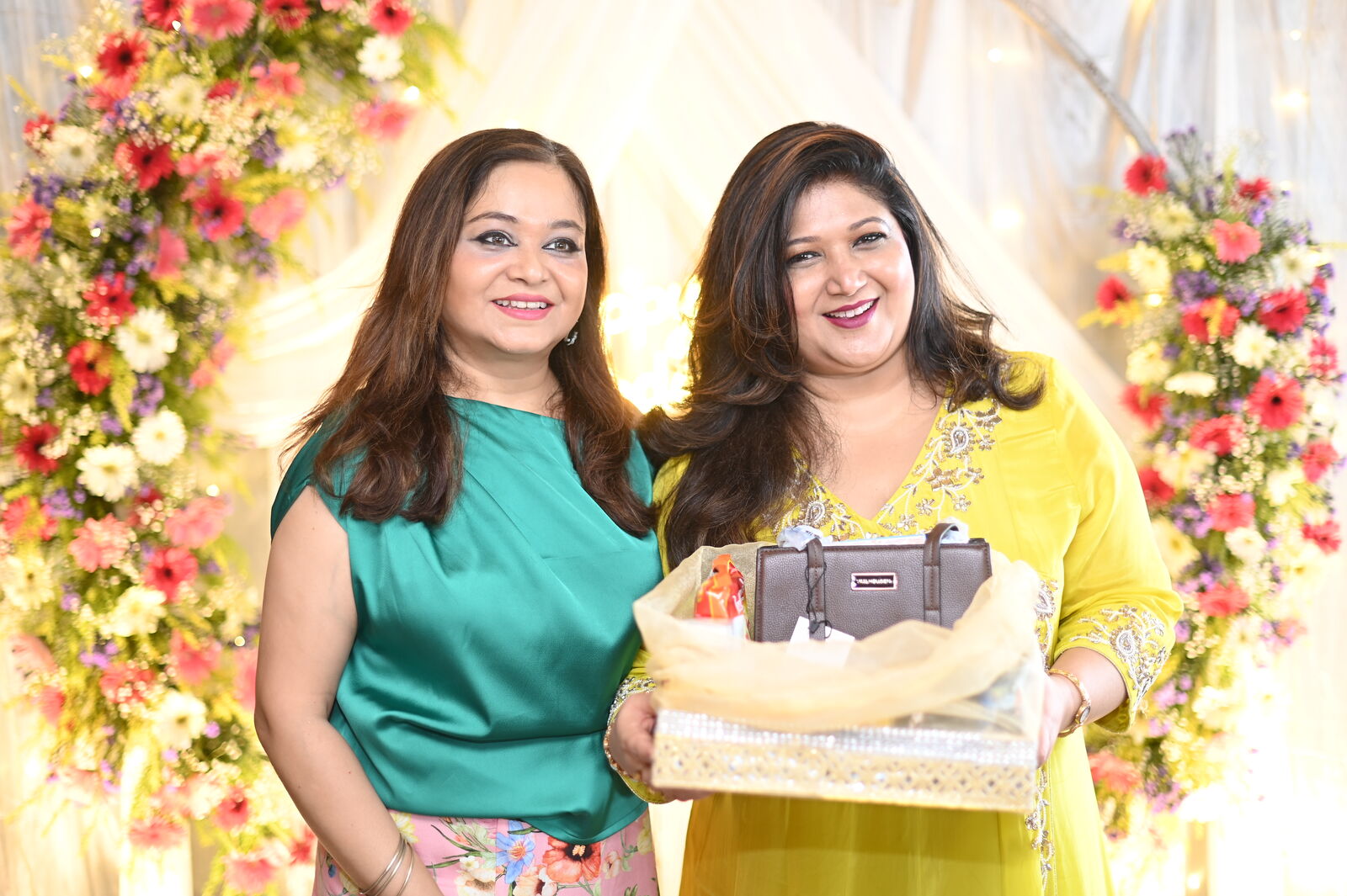 Guests holding the Cosy Box gift hamper