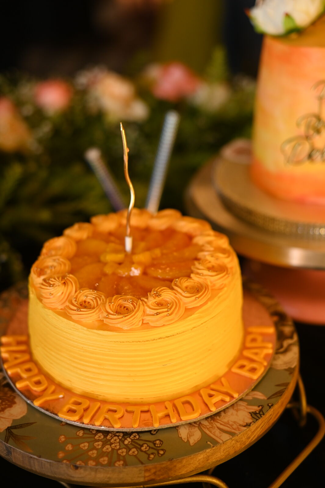 Signature golden Cosy Box celebration cake on a gold platter
